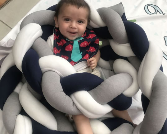 Protector de cuna de trenza